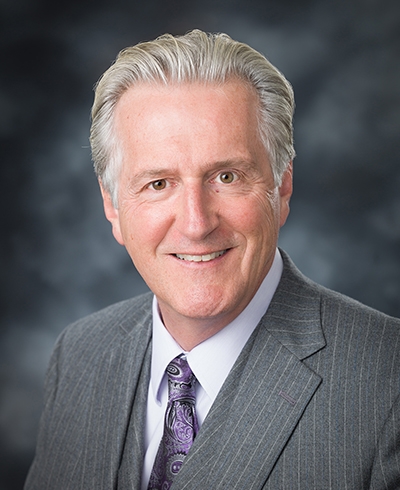 Mike E. Smith
